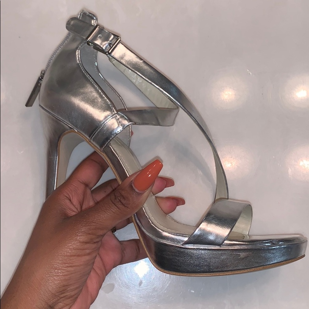 Gently worn silver BCBG sandal heel